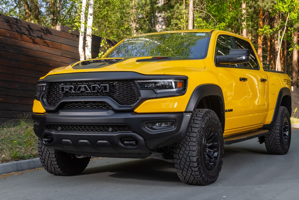 yellow Dodge Ram Trx Havok Edition, pickup parked in park