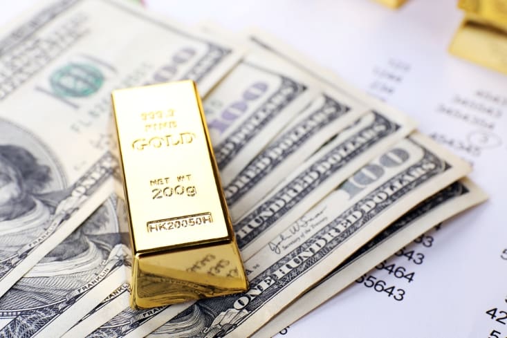 العلاقة بين أسعار الفائدة وأسعار الذهب