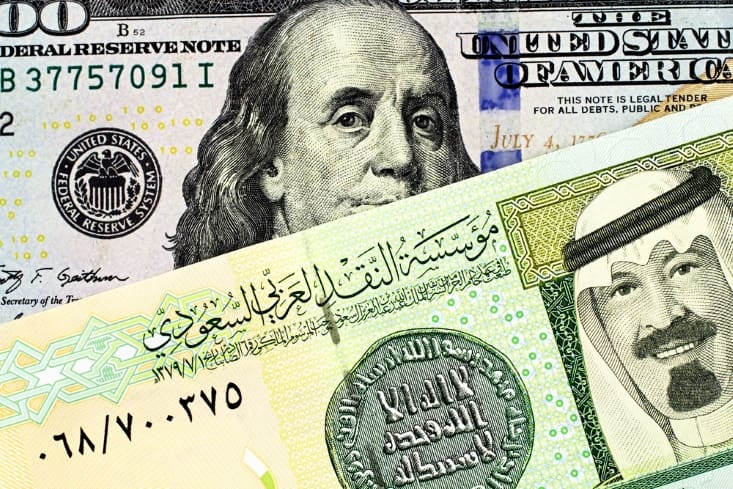 ربط الريال بالدولار