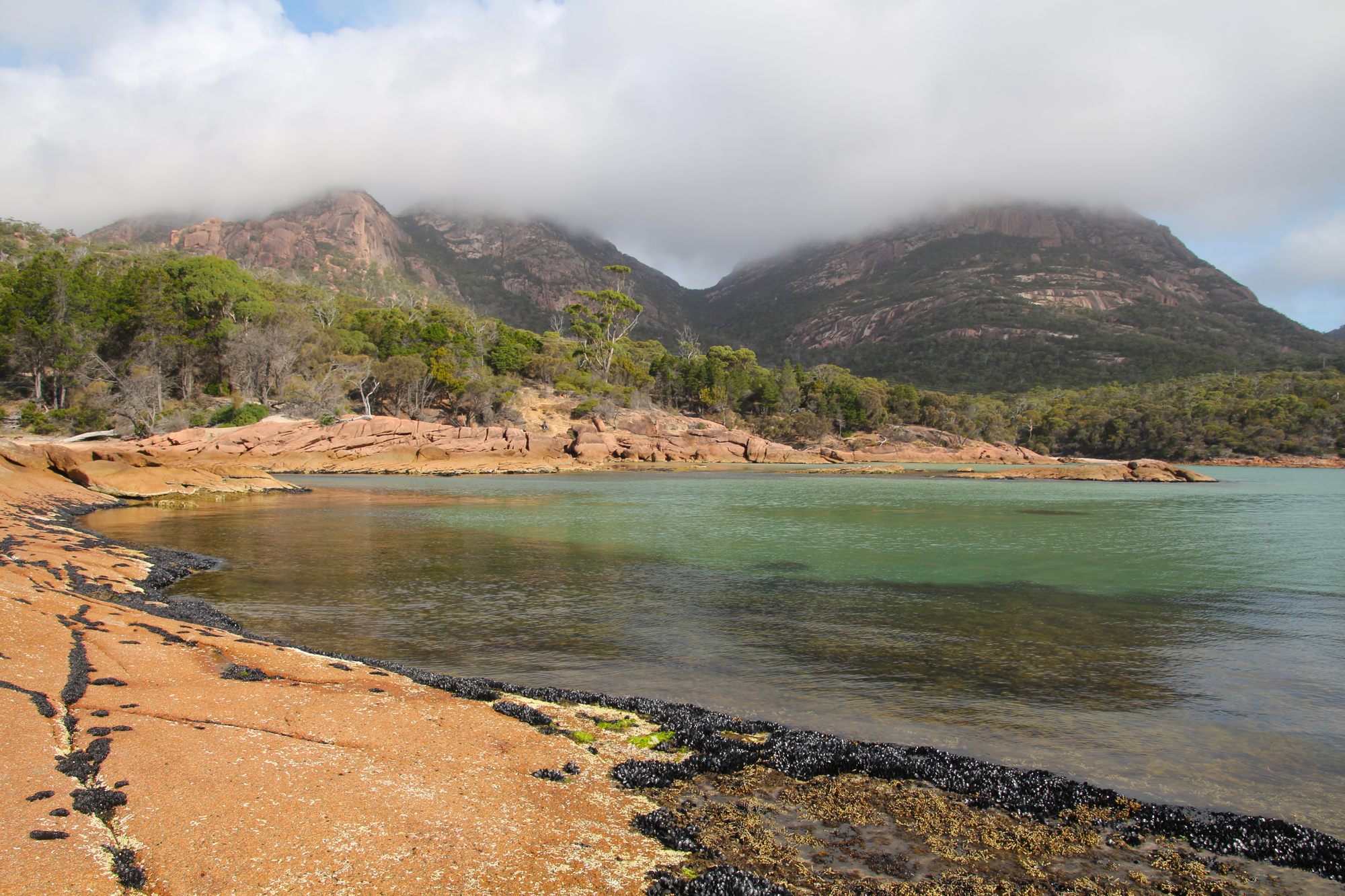Honeymoon Bay is located on the Freycinet Peninsula of Tasmania, Australia